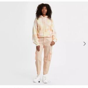 Levi’s Premium Loose Pale Pink Cargo Denim Pants, size 25